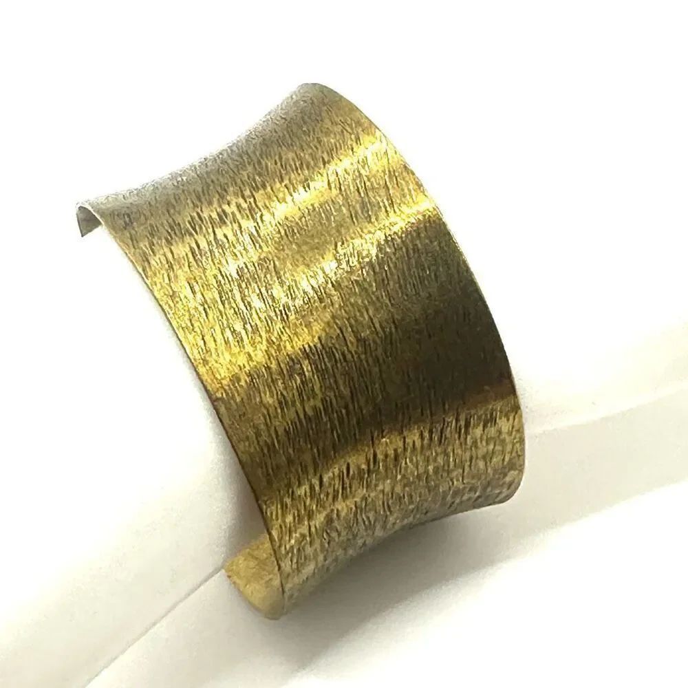 Gold tone open cuff bracelet